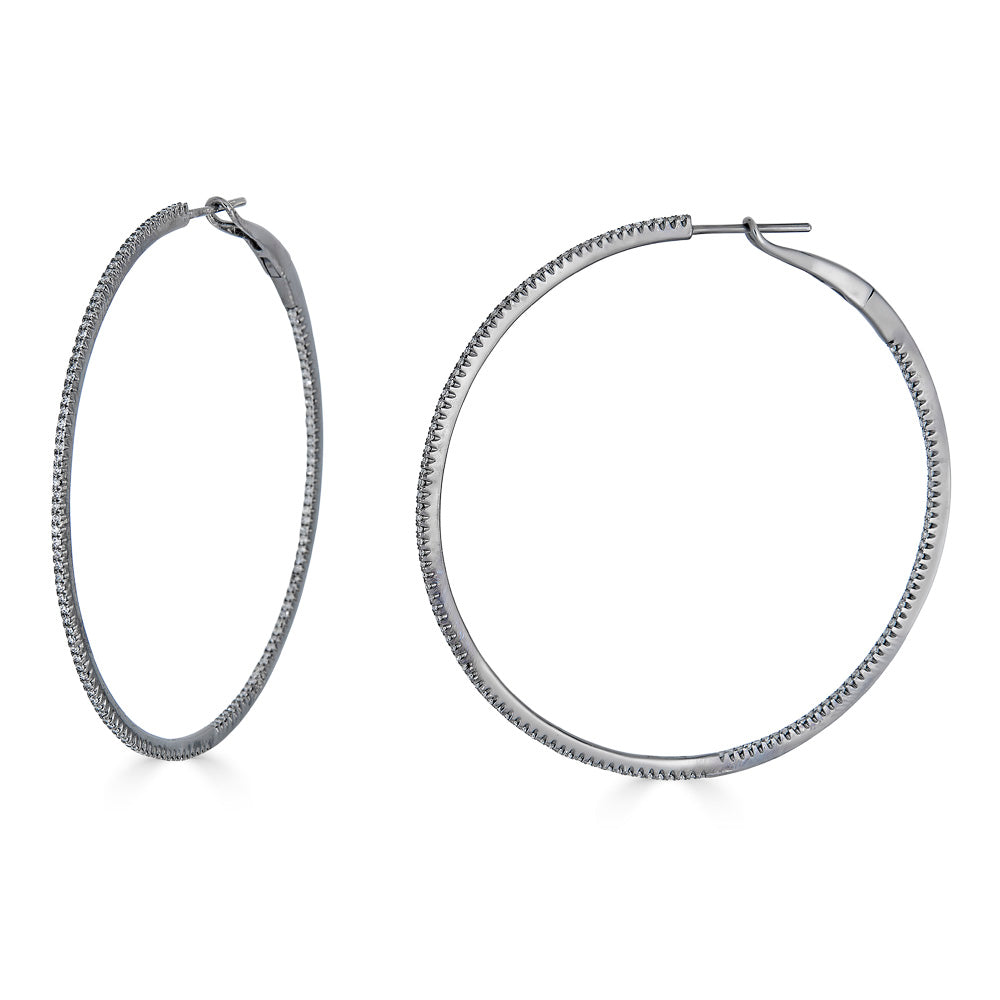 SKINNY DIAMOND HOOPS - XXL-Hoops-These extra large hoops feature a skinny row of pave diamonds on the outside as well as the inside of the hoop making it an elevated accessory for the ear. - available in 14k yellow, white, rose and black gold - diamonds: approximately 0.80 total carat weight; G-H color, SI clarity - 2" in diameter - shown on model in white gold, rose gold and black gold - sold as a pair-Anneaux Jewelry