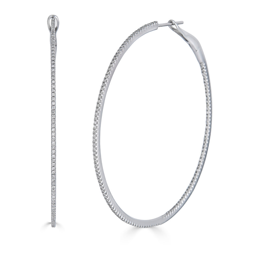 SKINNY DIAMOND HOOPS - XXL-Hoops-These extra large hoops feature a skinny row of pave diamonds on the outside as well as the inside of the hoop making it an elevated accessory for the ear. - available in 14k yellow, white, rose and black gold - diamonds: approximately 0.80 total carat weight; G-H color, SI clarity - 2" in diameter - shown on model in white gold, rose gold and black gold - sold as a pair-Anneaux Jewelry