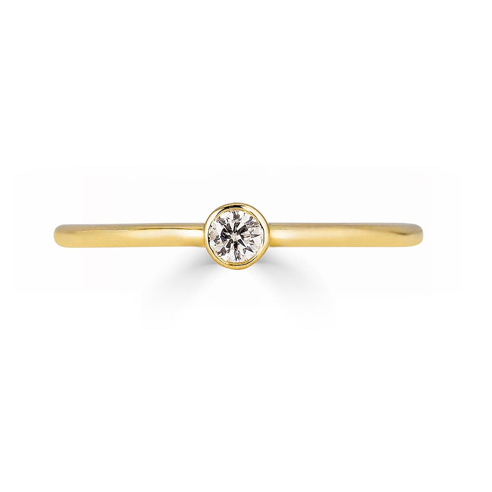 SINGLE DIAMOND BEZEL RING-Rings-This simple, single diamond bezel band is pretty enough to wear alone or to add a touch of sparkle to your stack. - available in 14k yellow, white and rose gold - diamond: approximately 0.03 total carat weight; G-H color, SI clarity - shown on model in yellow gold - custom sizing available: ice@anneauxjewelry.com-Anneaux Jewelry