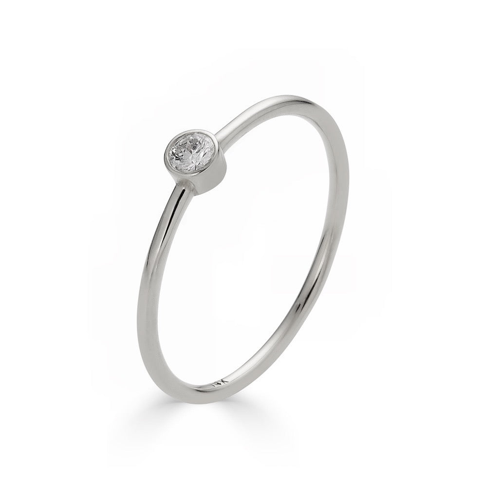 SINGLE DIAMOND BEZEL RING-Rings-This simple, single diamond bezel band is pretty enough to wear alone or to add a touch of sparkle to your stack. - available in 14k yellow, white and rose gold - diamond: approximately 0.03 total carat weight; G-H color, SI clarity - shown on model in yellow gold - custom sizing available: ice@anneauxjewelry.com-Anneaux Jewelry