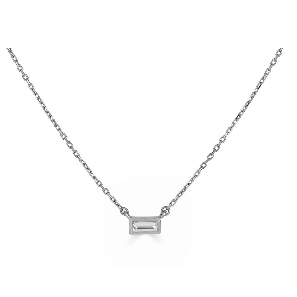 BAGUETTE DIAMOND BEZEL NECKLACE-Necklaces-A single baguette diamond is set in a gold bezel setting on a delicate chain. - available in 14k yellow and white gold - diamond: approximately 0.10 carat total weight; G-H color, SI clarity - triple extendable chain; 14” - 15” - 16” - lobster clasp - shown on model in yellow gold - custom size diamond available: ice@anneauxjewelry.com-Anneaux Jewelry