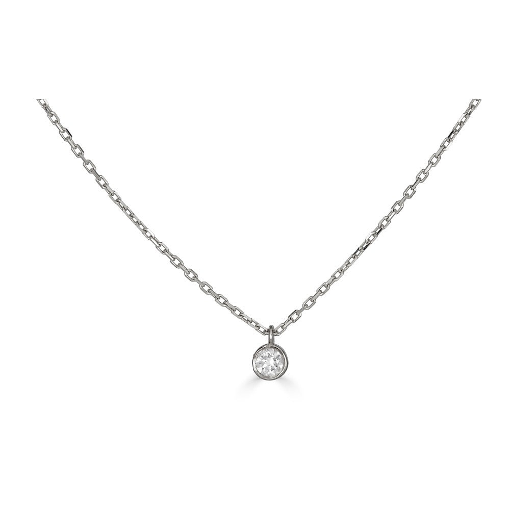 SOLITARE DIAMOND BEZEL NECKLACE-Necklaces-A simple bezel-set diamond solitaire hangs delicately from a 14k gold chain and will add the perfect dot of sparkle to your neck. Its adjustable diamond cut cable link chain makes it one of our favorite layering pieces. - available in 14k yellow, white and rose gold - diamond: approximately 0.05 total carat weight; G-H color, SI 1-2 clarity - 2.3 mm size bezel - triple extendable chain: 14” - 15” - 16” - lobster clasp - shown on model in yellow gold - cu