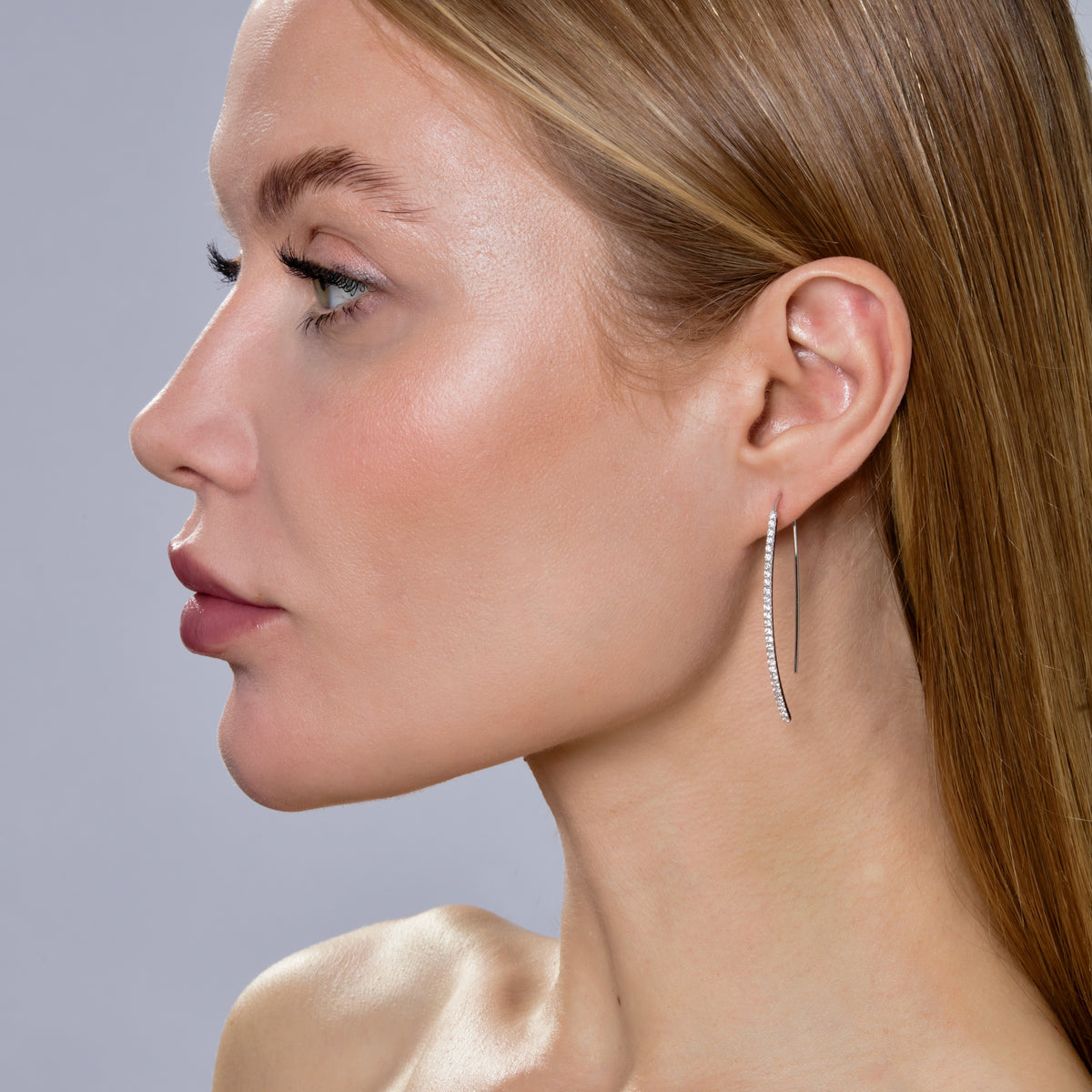 HANGING DIAMOND LINE EARRINGS-Chandelier-A long arch of diamonds hang in a straight line effortlessly from the ear. - available in 18k yellow and white gold - diamonds: approximately 0.95 total carat weight, G-H color, SI clarity - shown on model in white gold - sold as a pair-Anneaux Jewelry