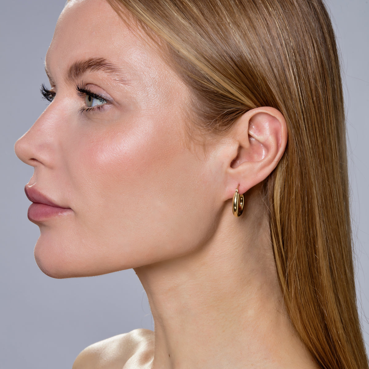 CLASSIC GOLD HOOPS - SMALL-Earrings-One of our favorites, this 14k gold hoop is made slightly smaller than the medium-sized version without compromising any of the sentiment. - available in 14k yellow and white gold - 3/4" - shown on model in yellow gold - sold as a pair-Anneaux Jewelry