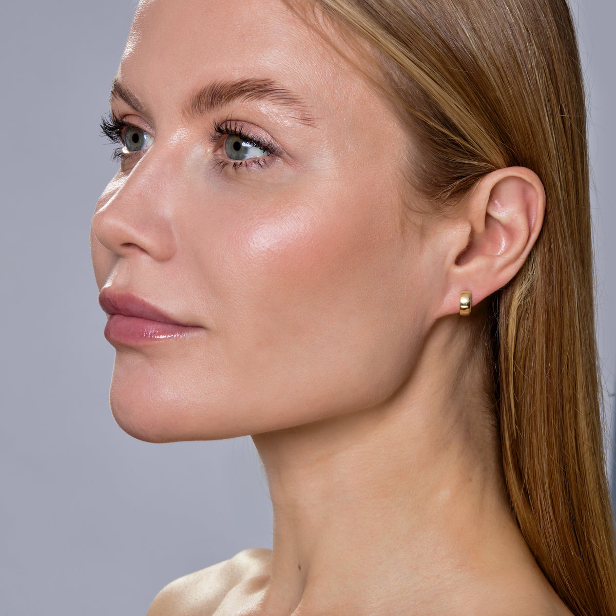 THICK GOLD HUGGIES-Earrings-Extra thick gold delicately hugs the ear in this stand-out pair of baby gold earrings. - available in 14k yellow and white gold - 10 mm - sold as a pair-Anneaux Jewelry