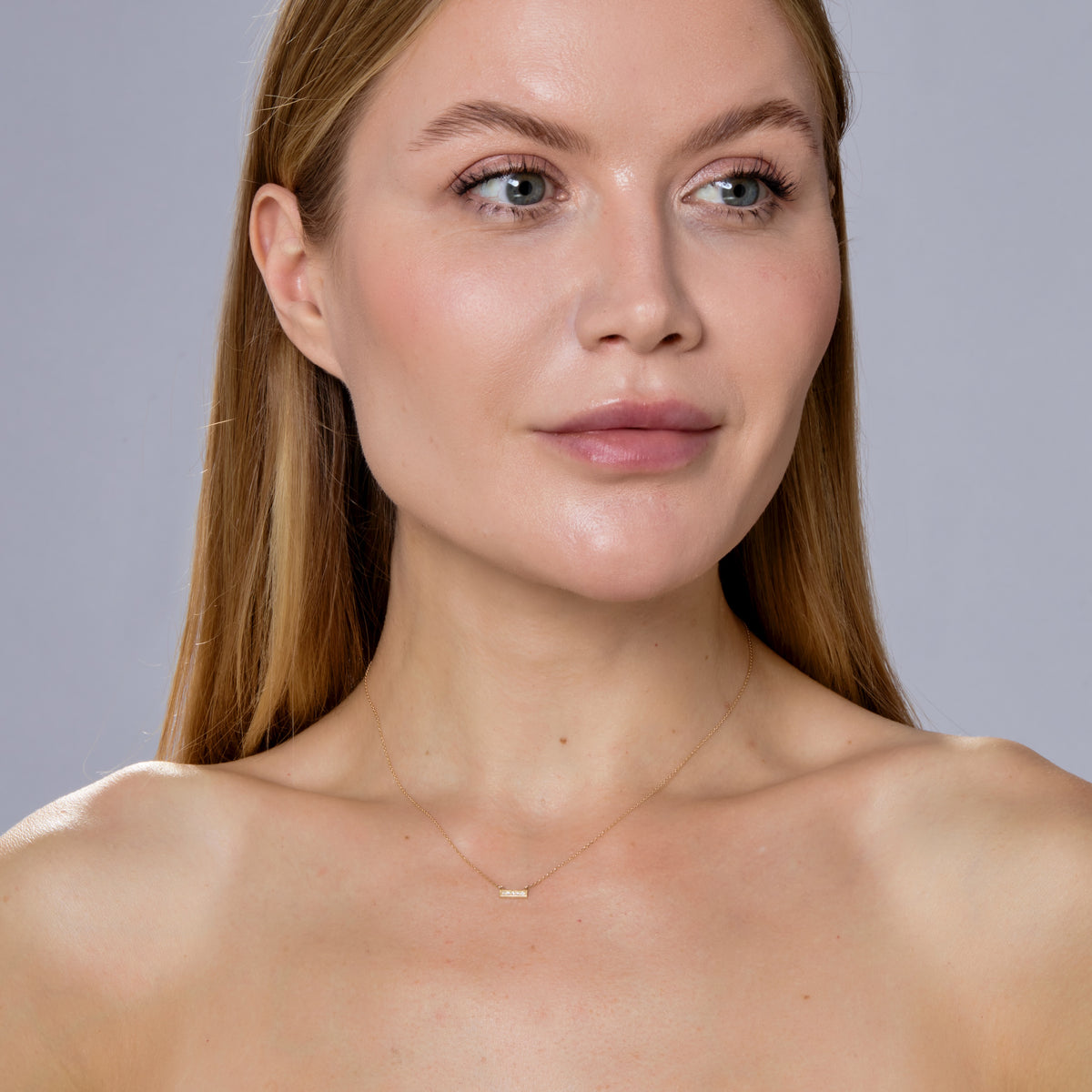 DIAMOND BAR NECKLACE-Necklaces-Five diamonds sit across a 14K solid gold bar with milgrain trim and attached to a diamond cut cable link chain. This everyday accessory knows how to "raise the bar." - available in 14k yellow and white gold - diamonds: approximately 0.04 total carat weight, G-H color, SI clarity - triple extendable chain; 14” - 15” - 16” length - lobster clasp - shown on model in yellow gold-Anneaux Jewelry