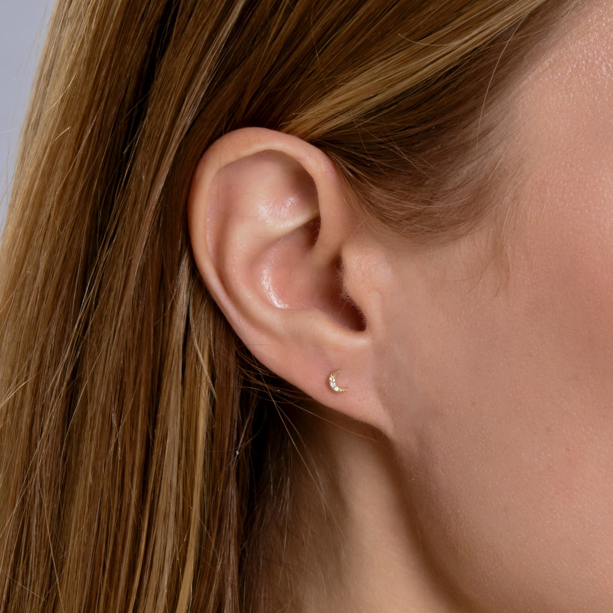 DIAMOND MOON STUD-Studs-The moon is a celestial symbol for change. Show you are ready for some with our version in diamonds and gold. - available in 14k yellow and white gold - diamonds: G-H color, SI clarity - 14k gold butterfly backing - shown on model in yellow gold-Anneaux Jewelry
