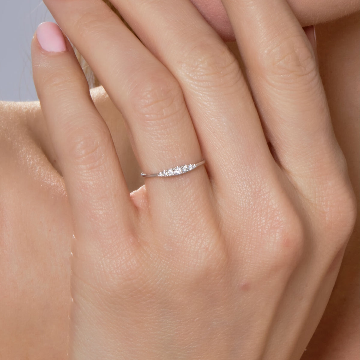 GRADUATED DIAMOND BAR BAND-Skinny enough to stack, yet substantial enough to wear on its own, this is the perfect every day diamond ring. Set in 18K solid gold, graduated diamonds tapper off to each side. - available in 18K white, yellow and rose gold - diamonds: approximately 0.10 total carat weight; G-H color, SI clarity - shown on model in white gold - custom sizing available: ice@anneauxjewelry.com-Anneaux Jewelry