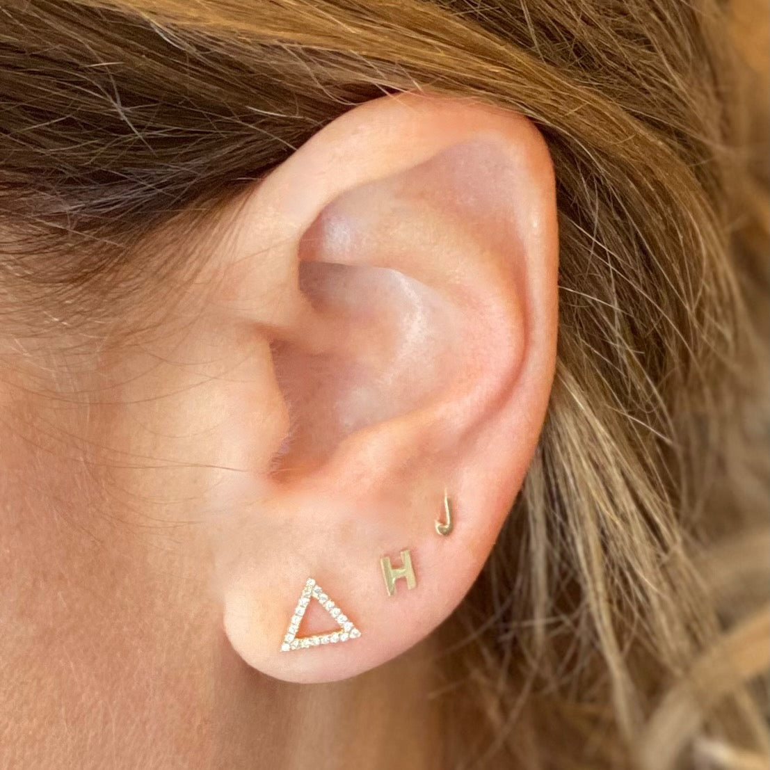 SOLID GOLD LETTER INITIAL STUD-Studs-Our baby solid gold letter in 14k yellow gold is the perfect way to add an initial to your ear. - 14k yellow gold - 14k gold butterfly backing - SOLD INDIVIDUALLY [add two to your cart to make a pair]-Anneaux Jewelry